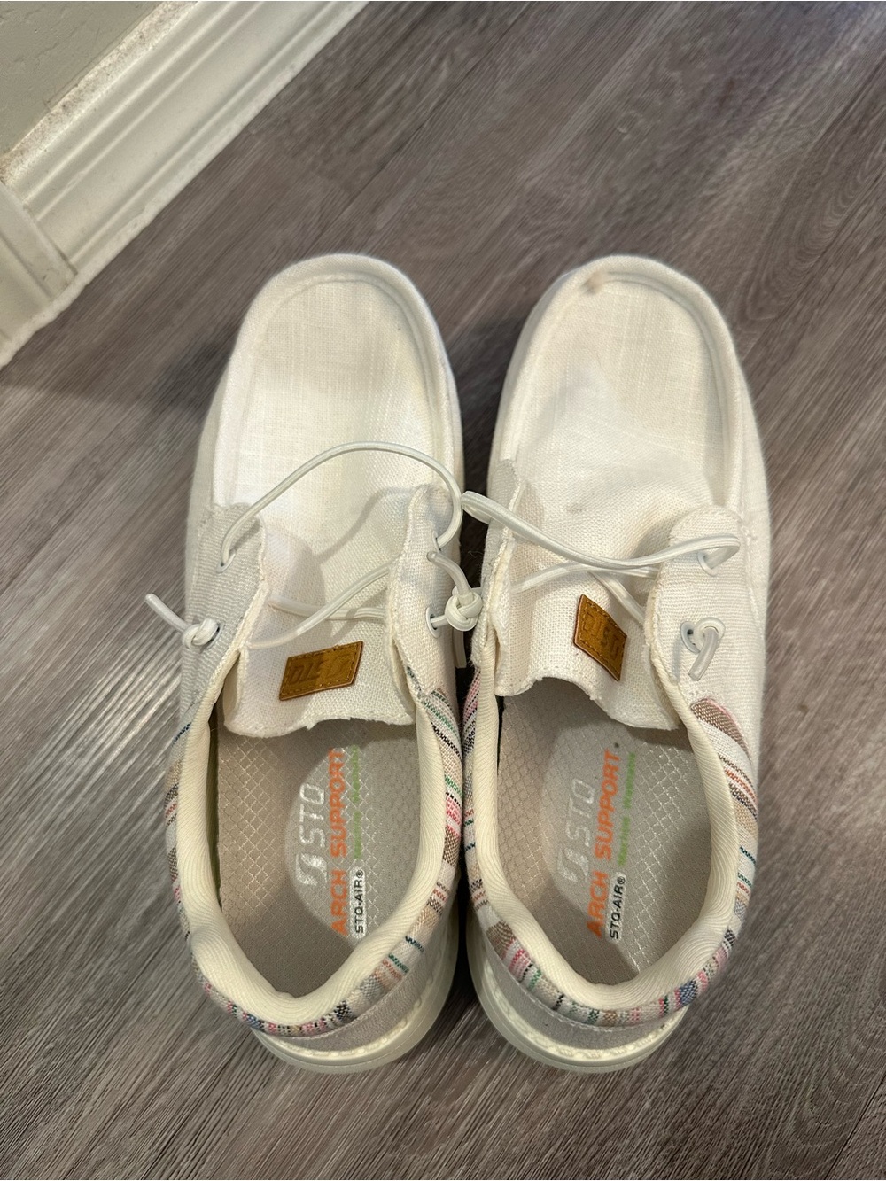 White Canvas Slip-On Sneakers with Subtle Stripe Trim